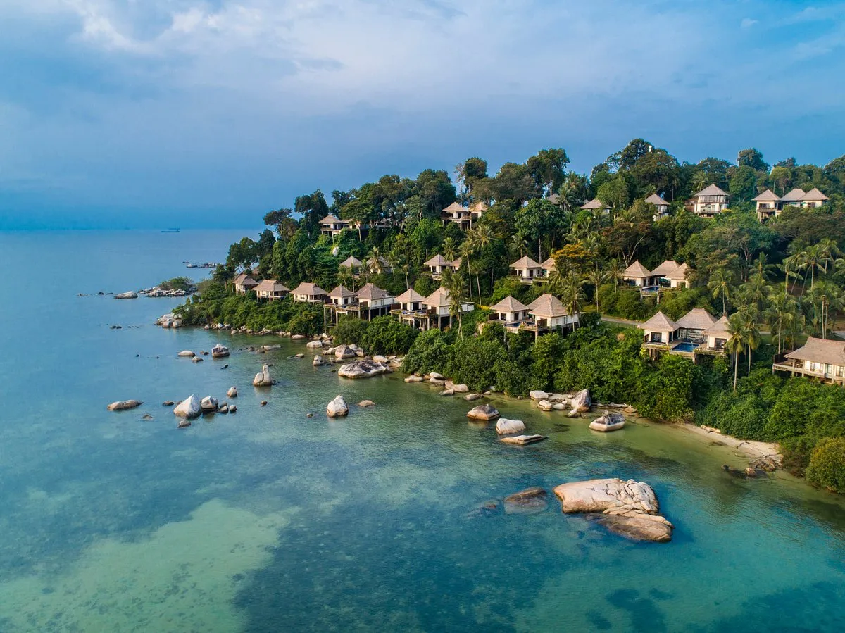 Athletes racing along the coastal roads of Bintan Island